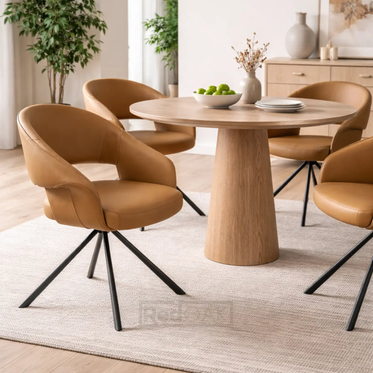 Dining room with wooden table and brown chairs on a light wood floor.