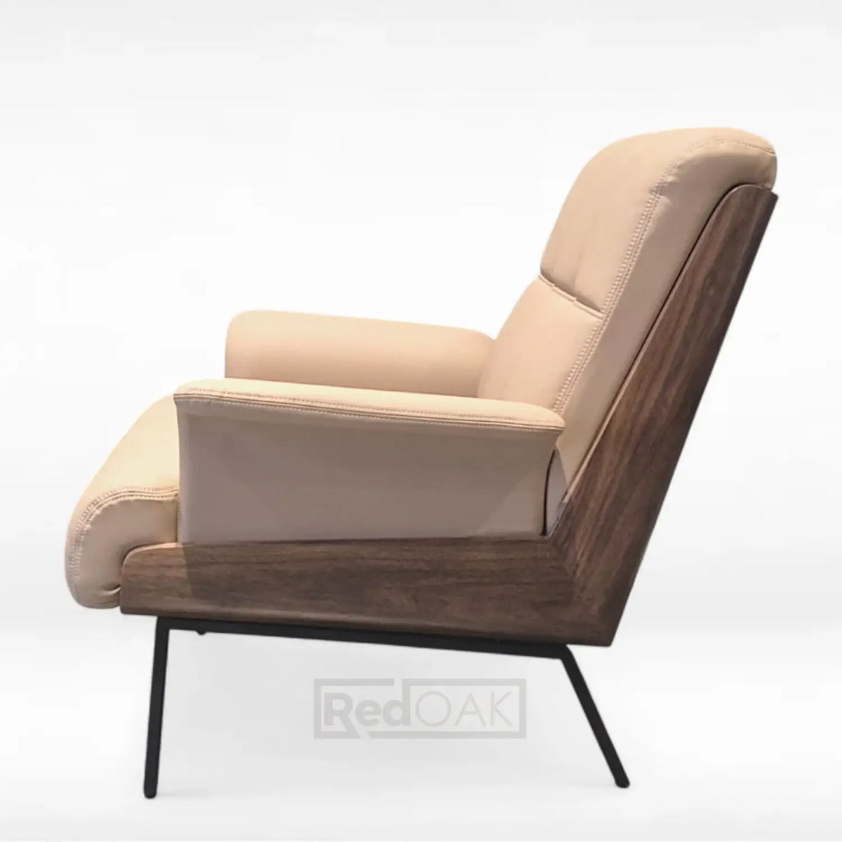 Beige armchair with wooden frame and black legs on a white background