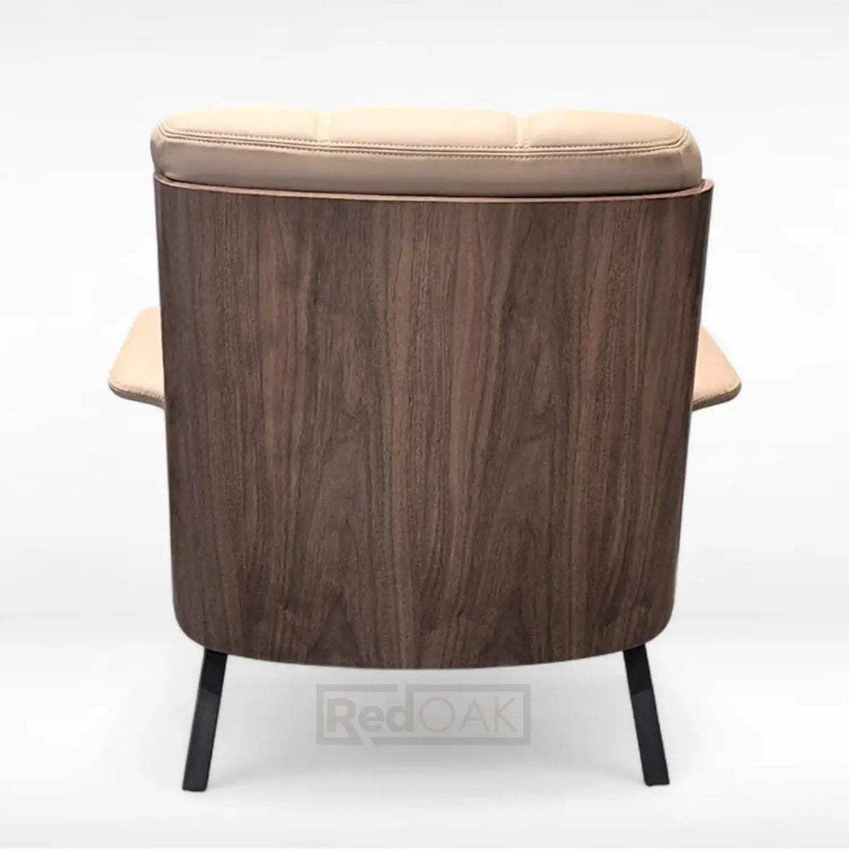 Wooden armchair with beige cushion on a white background