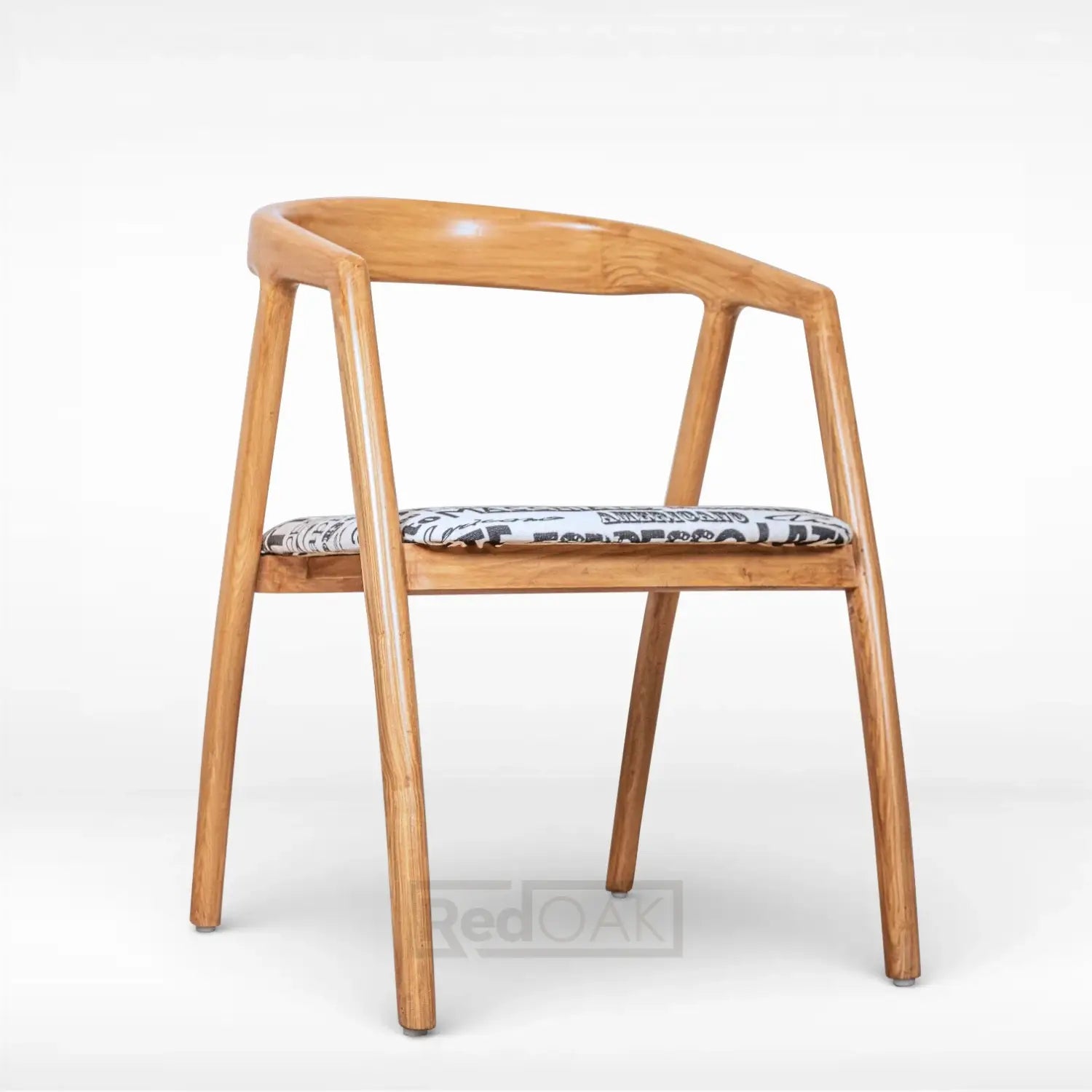 Wooden chair with a patterned cushion on a white background