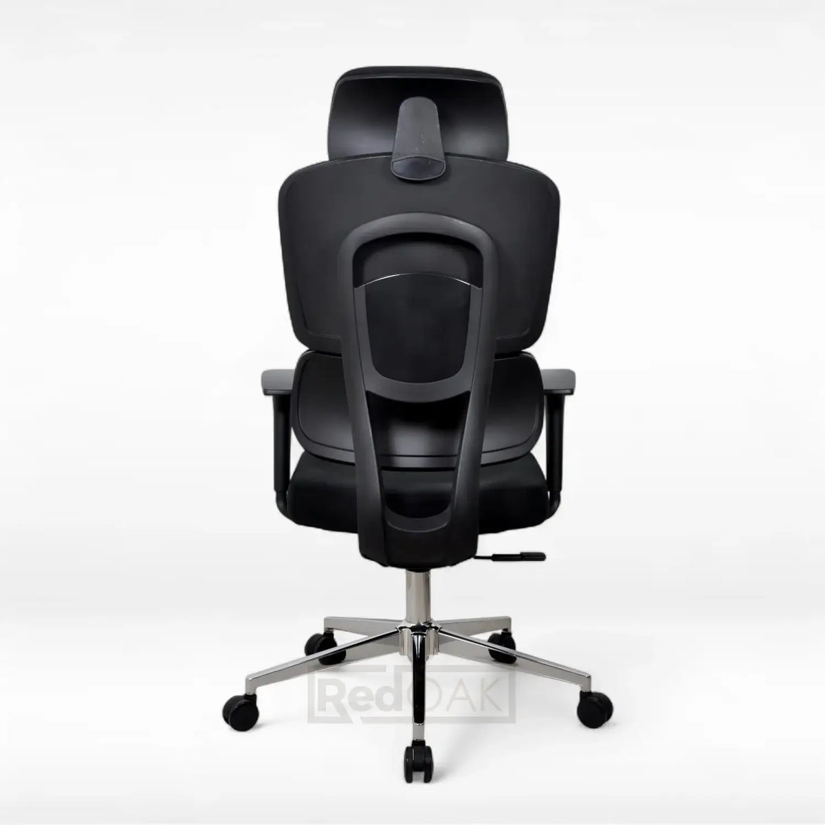 Black office chair with adjustable headrest on a white background