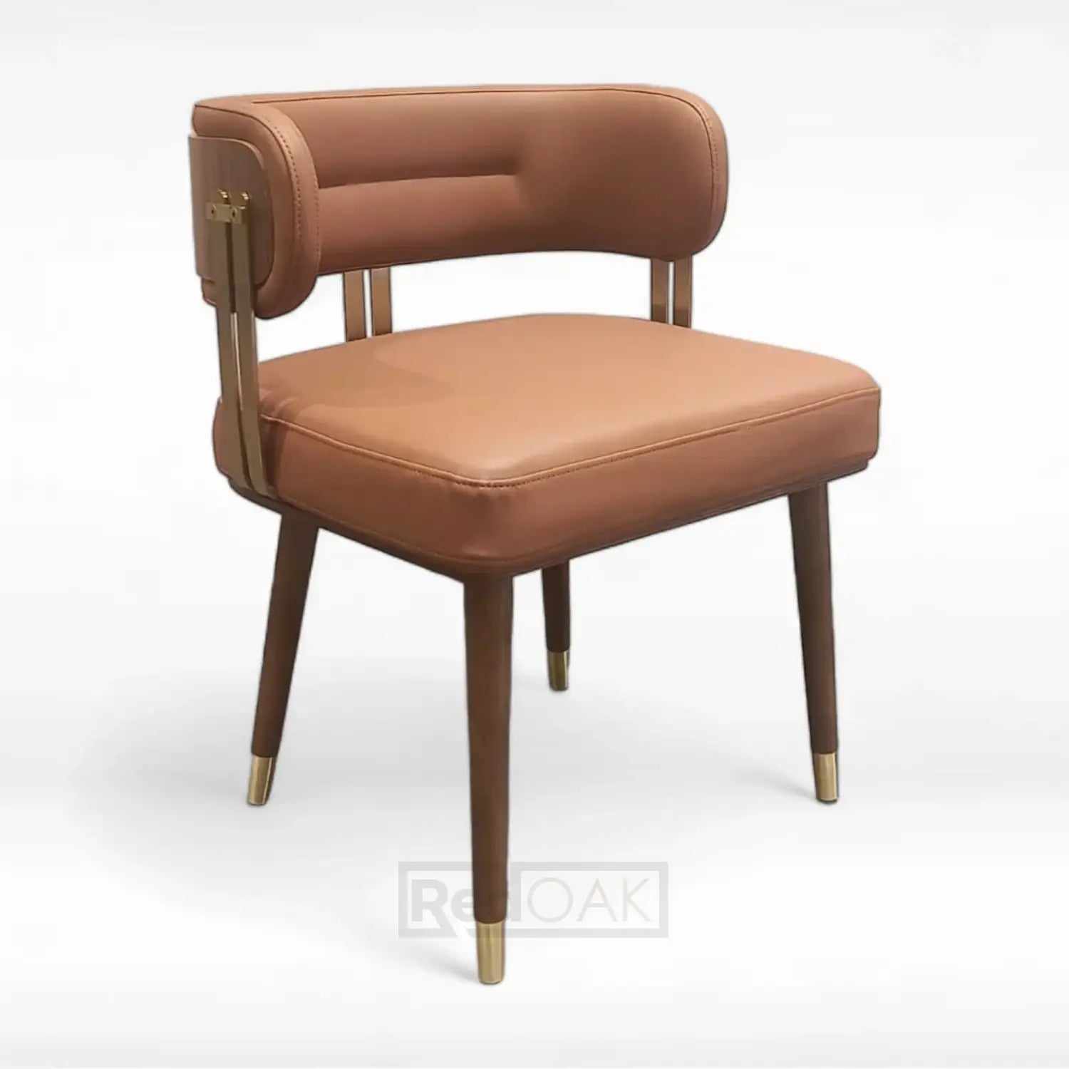 A brown upholstered dining chair with a cushioned backrest and seat, featuring gold-colored metal accents on the legs.