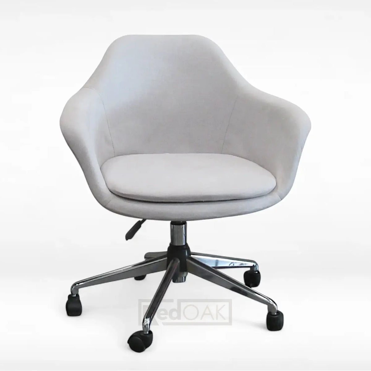 An ergonomically designed office chair with a curved moulded seat in a neutral color, featuring a heavy duty metal base with height adjustment and castor wheels.