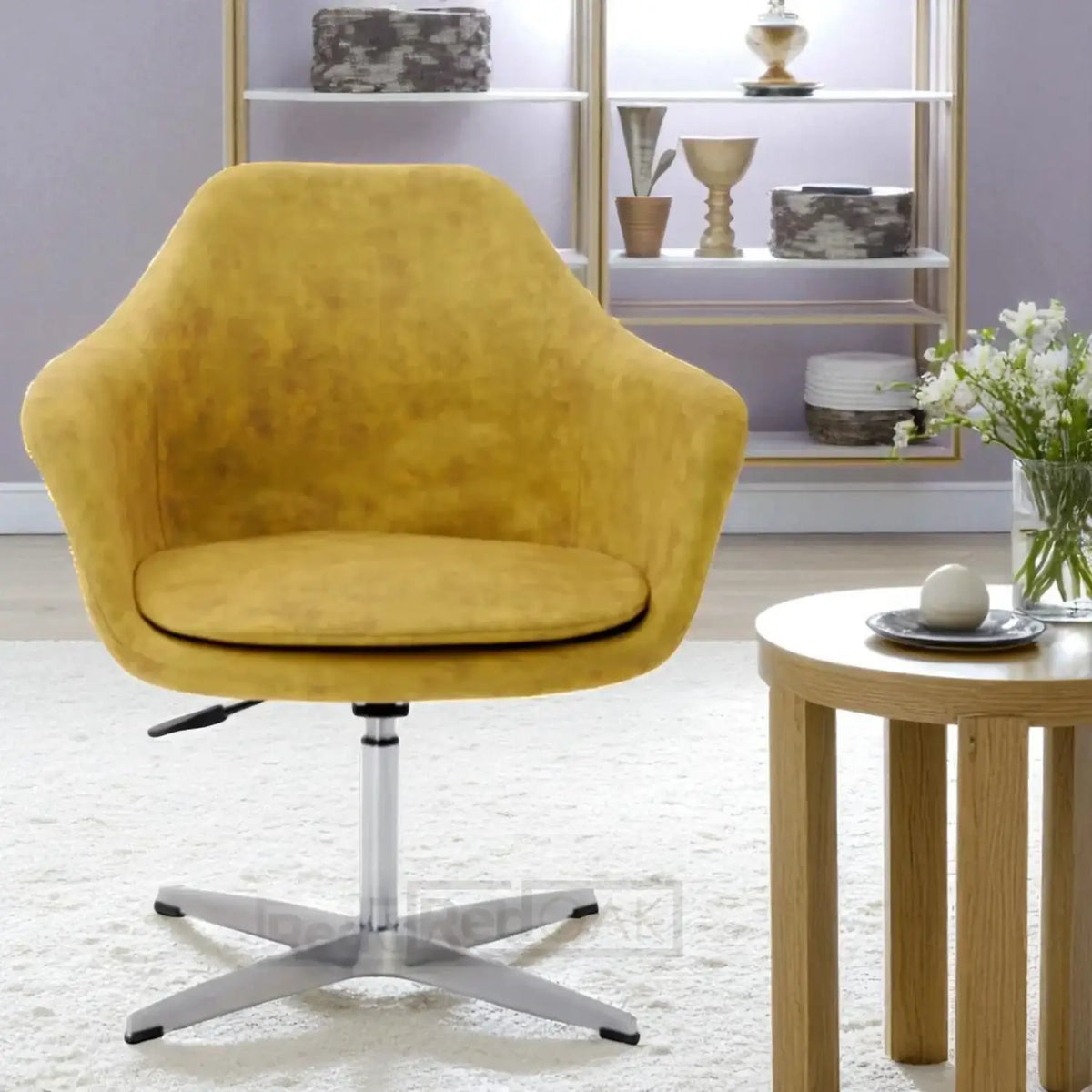 Yellow armchair in a living room setting with a table and decorative items.