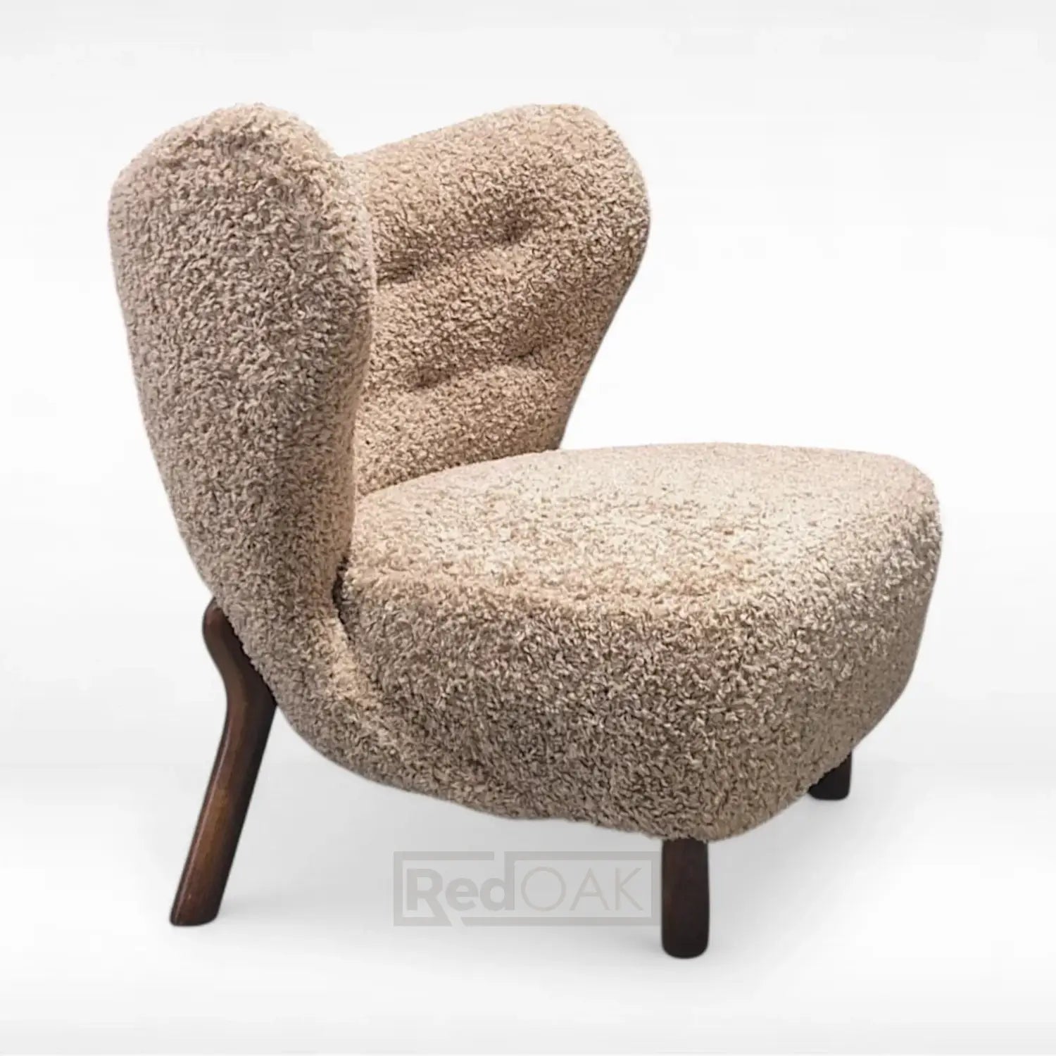 Beige boucle chair with wooden legs on a white background