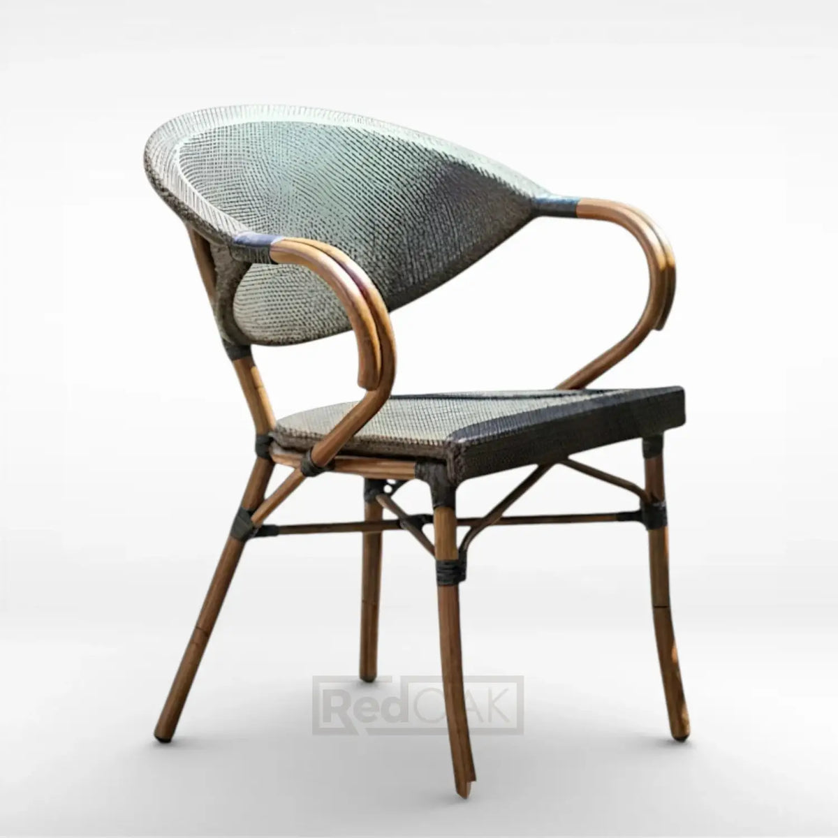 Wicker chair with a woven backrest and seat on a white background