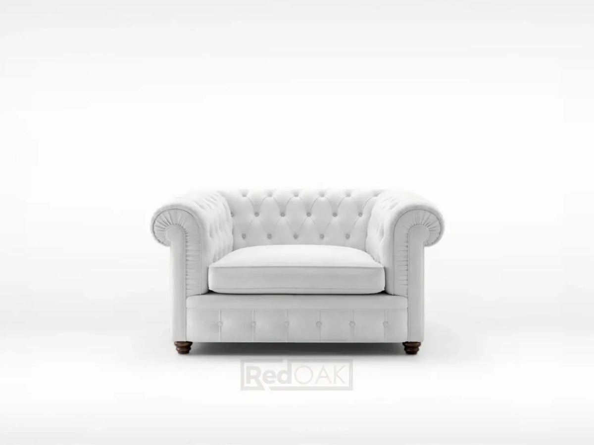 Gray tufted armchair on a white background