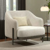 Beige armchair with a pillow in a living room setting