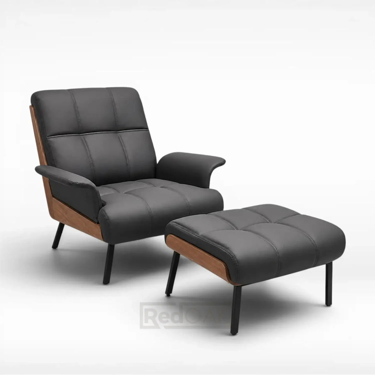 Black armchair with wooden accents and matching ottoman