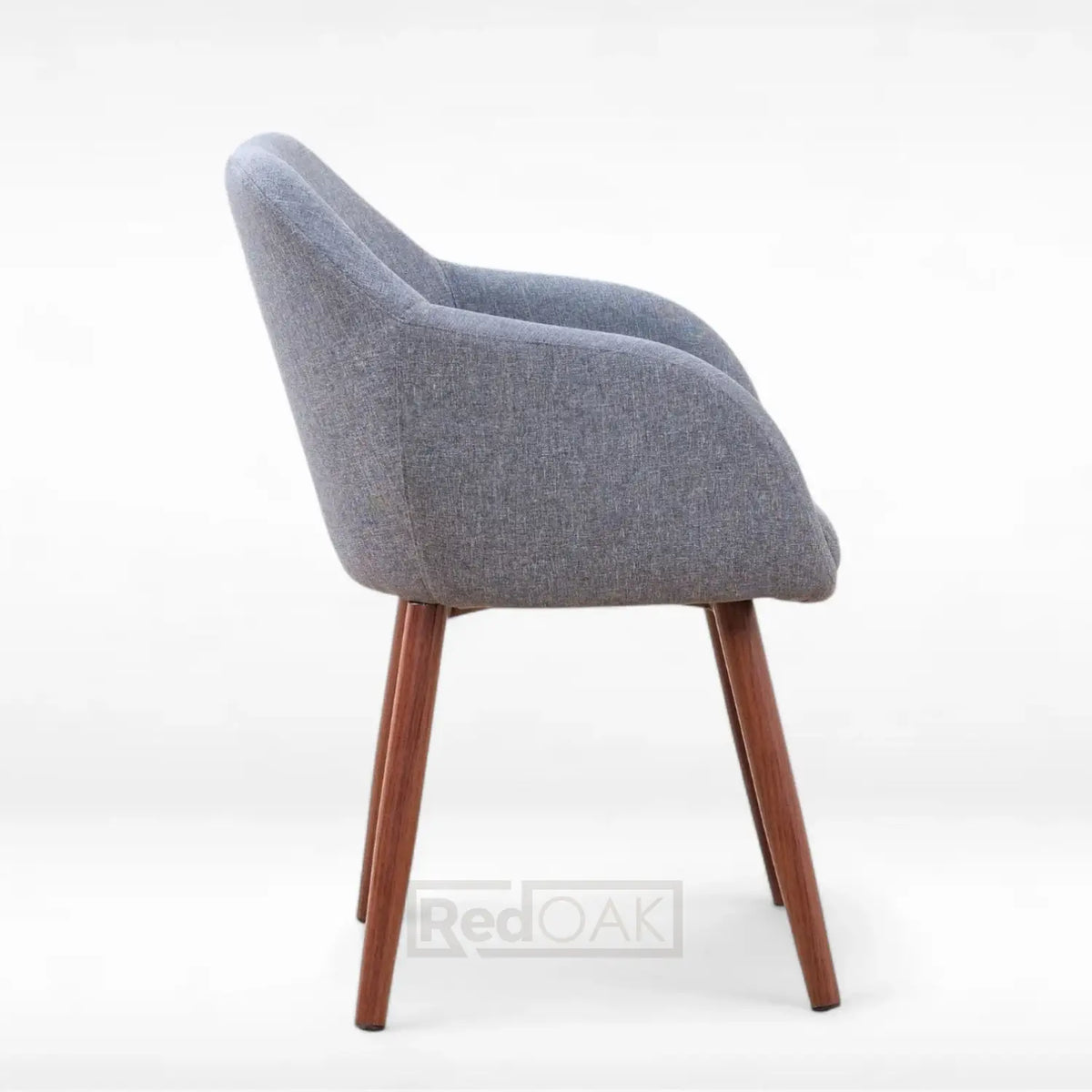 Gray upholstered chair with wooden legs on a white background
