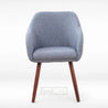 Blue upholstered chair with wooden legs on a white background