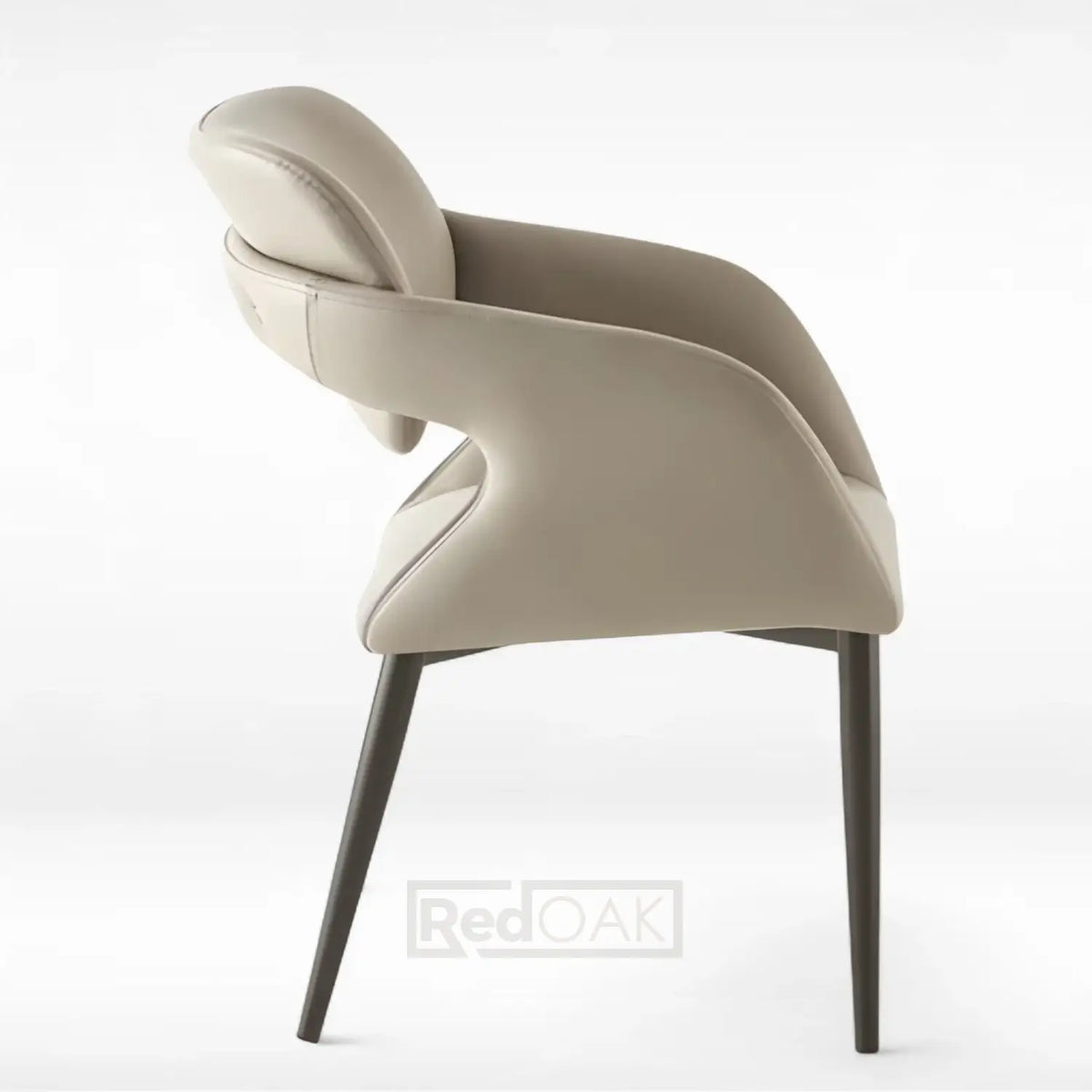 Beige armchair with dark legs on a white background