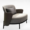 Modern armchair with a textured cushion on a white background