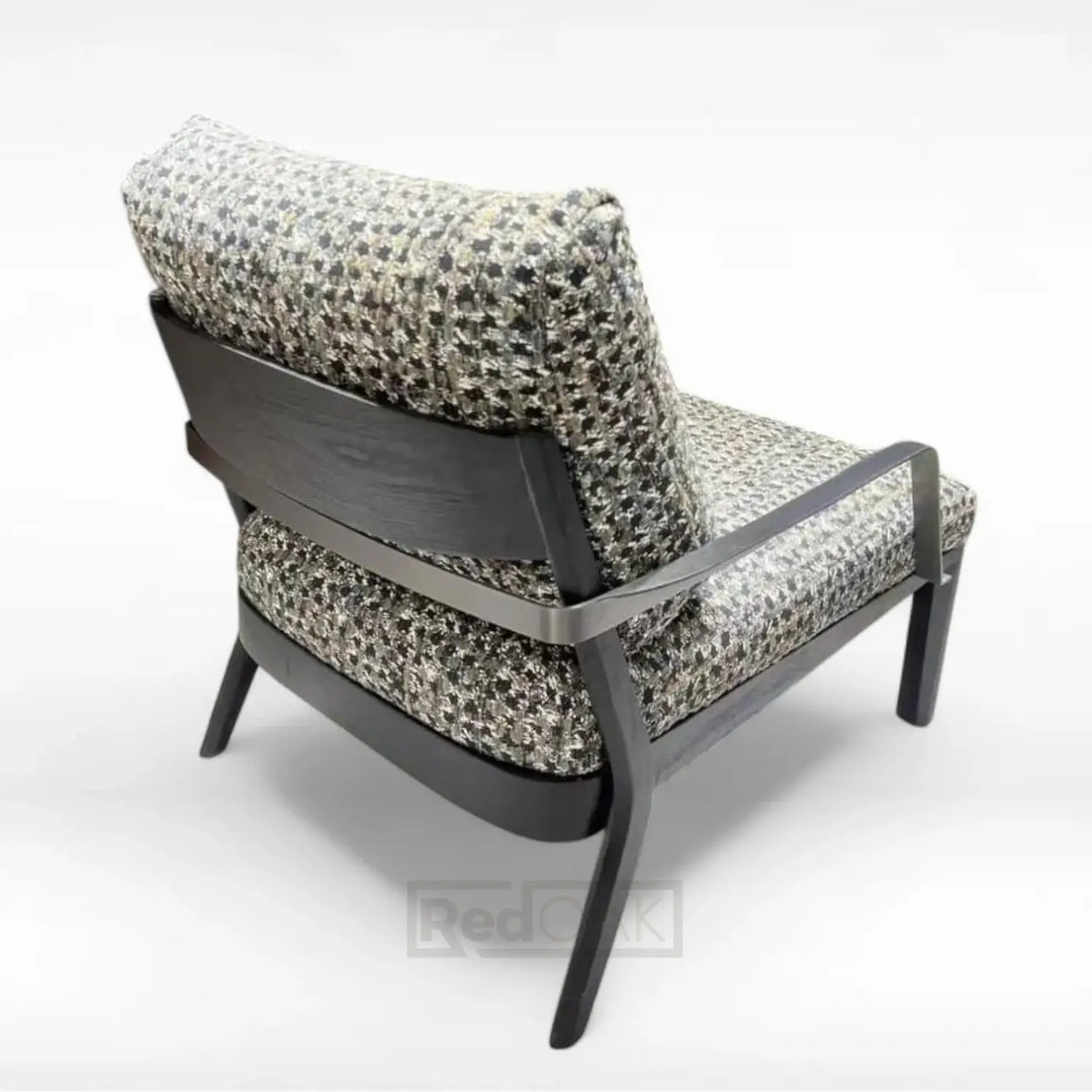 Modern chair with patterned cushion on a white background