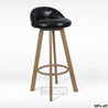 A black leatherette swivel cushion seat barstool with metal legs and wooden finish.