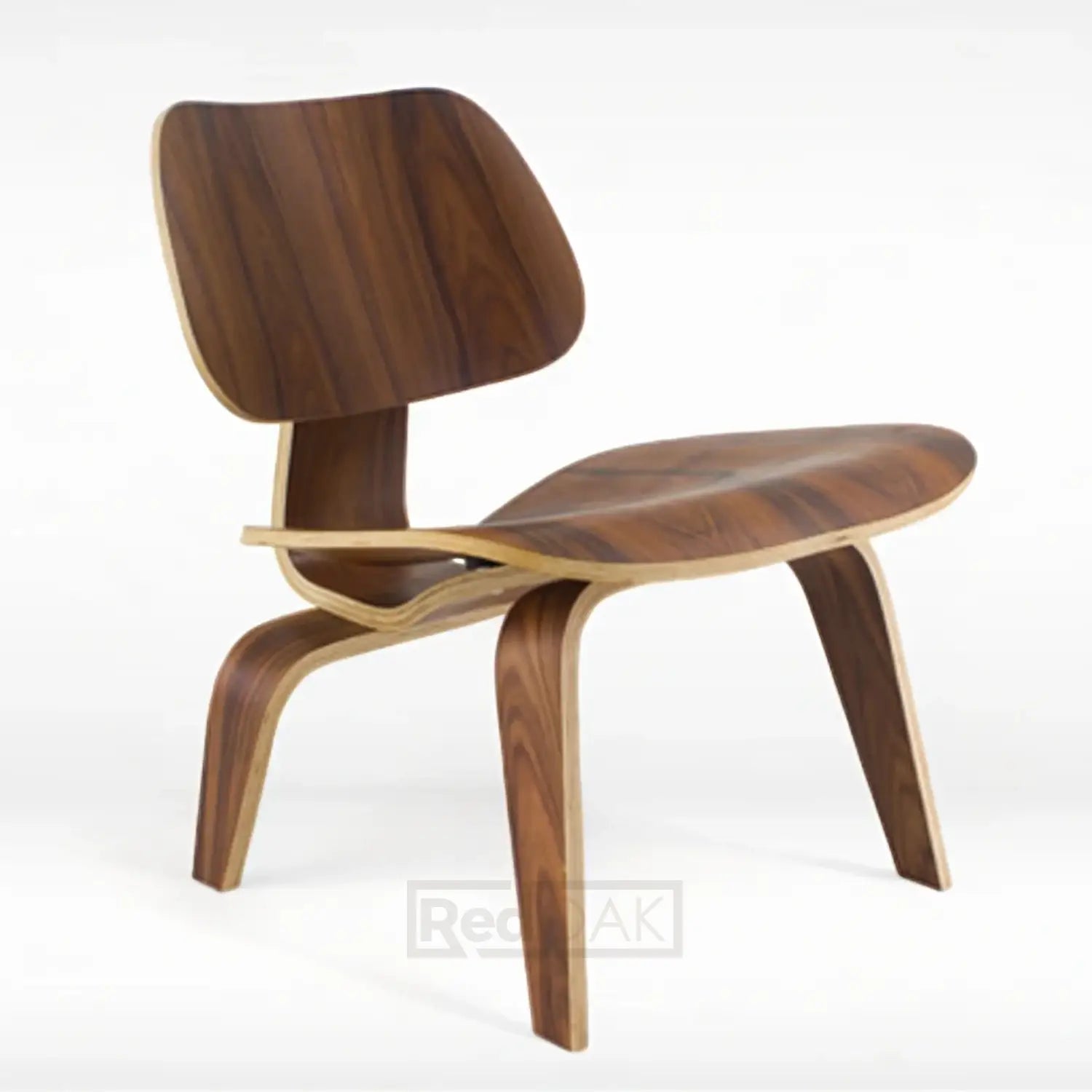 A brown wooden lounge chair with a curved backrest and seat, featuring a minimalist design.