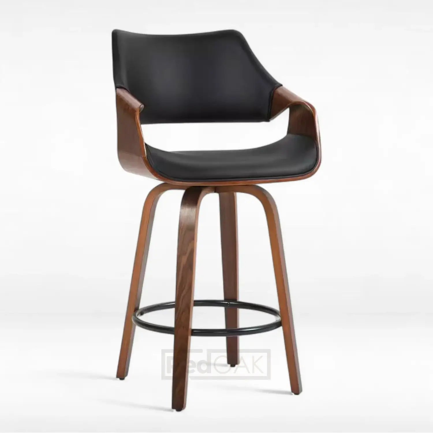 A contemporary RedOAK JONNY swivel barstool with a black leatherette seat and backrest, a wooden curved leg, and a black metal footrest.