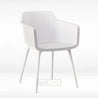 White chair with a perforated backrest on a light gray background