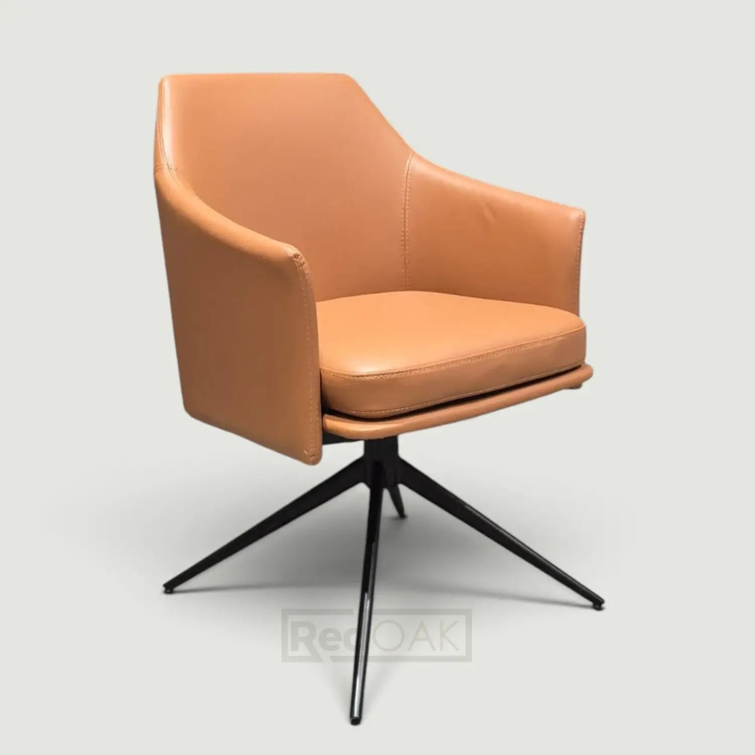 A modern swivel dining chair upholstered in warm tan leather with a black metal star base, shown against a light gray background.