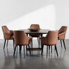 Dining table with brown dining chairs in a modern setting