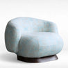 Blue patterned armchair on a white background