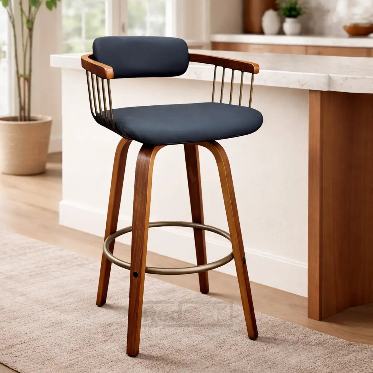 Bar stool with wooden legs and navy cushioned seat in a home setting