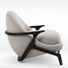Modern armchair with gray cushioned seat and black frame on a white background