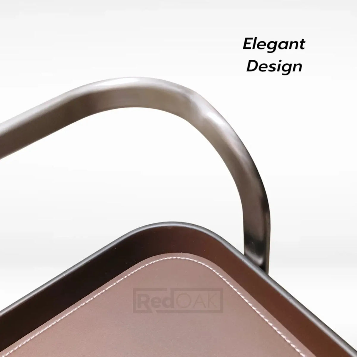 Close-up of a brown tray with metal handle on a white background, labeled 'Elegant Design'.