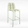 Bar stool with green and beige striped seat on a white background